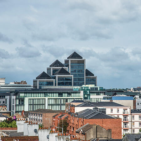 landscape shot of dublin skyline featuring the glass skyscrapers in the finance industry sector around the docklands