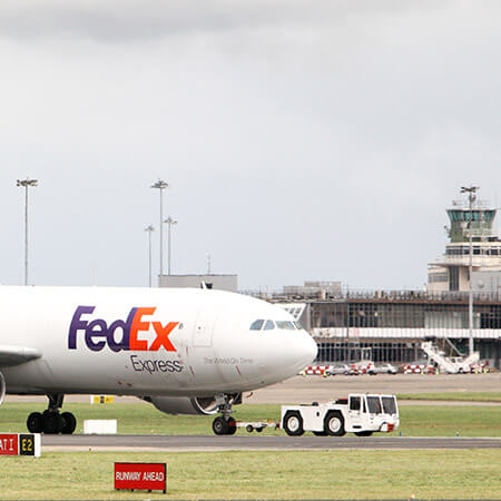 fedex transport plane on runway