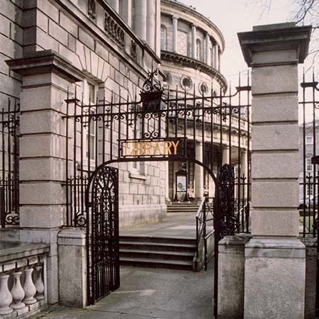 The black gate and stone columns which mark the entrance to the National Library